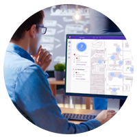 Businessman monitoring Edison dashboard on desktop computer