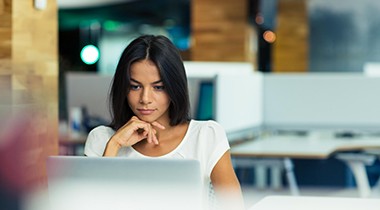 Woman working on device