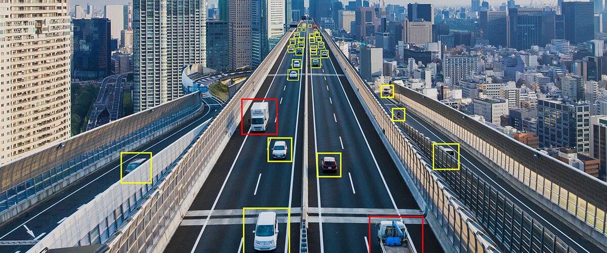 Camera detecting car and traffic from over bridge overpassing. smart cities, smart city technology, public safety technology