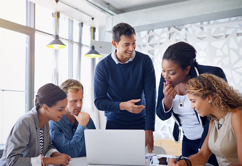 Group of business professionals having collaborative meeting