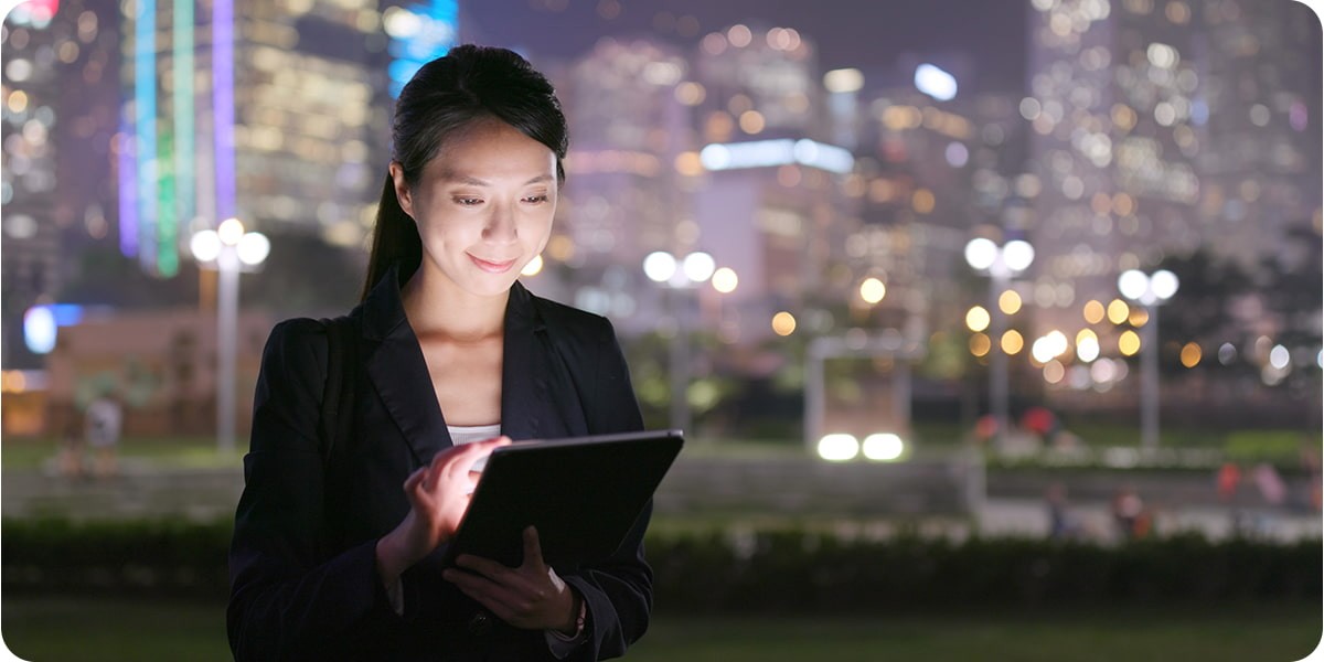 Business professionals use laptop to procure technology products